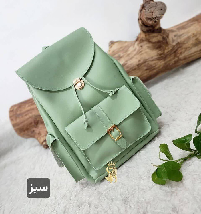 کوله پشتی زنانه مدل قفل T رنگ مشکی با بند قابل تنظیم و فضای جادار مناسب استفاده روزمره و اسپرت در پوشاک آروما فشن