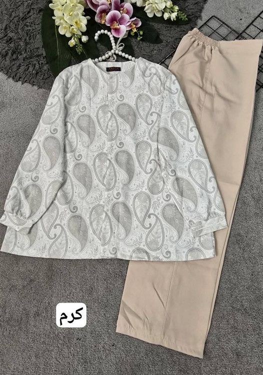 نمای نزدیک کت شلوار پسته زنانه جنس مازراتی درجه یک آروما فشن مناسب مجالس و عید