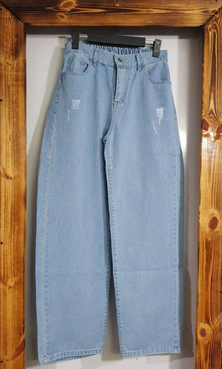 نمای نزدیک پارچه جین اصل سنگشور شده شلوار بگ آروما فشن