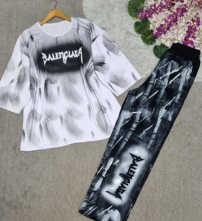 ست هانل H - جزئیات شلوار گرافیتی مشکی با طرح اسپری آبی و کمر کشی راحت