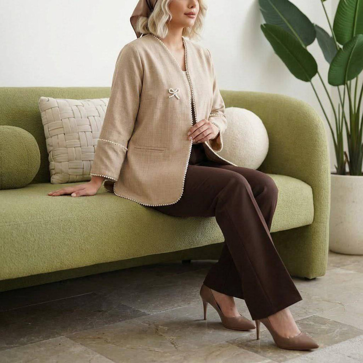 مانتو کتی پاپیون N نمای جلو بسته مانتو مجلسی زنانه با دکمه و پاپیون تزئینی