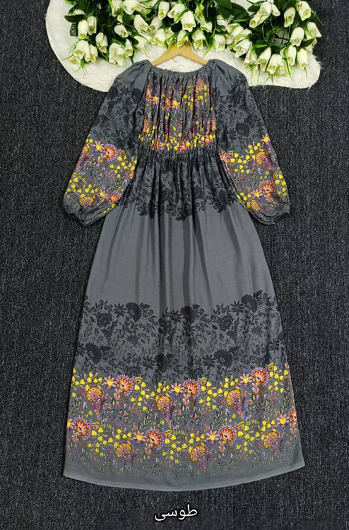 لباس ساحلی آبی - نمای نزدیک از حاشیه و تور دوزی ظریف