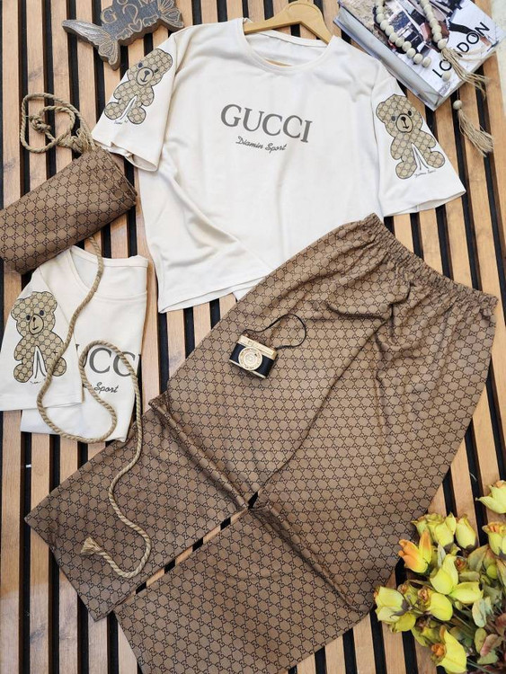 ست تیشرت شلوار زنانه جنس دورس پنبه اعلا و درجه ۱ مدل Gucci طرح خرسی F